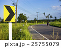 curve warning sign in the rural road, blurred face 25755079
