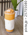 Thai tea smoothie on wooden table 25755080