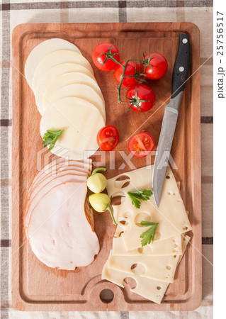 Delicious Meat And Cheese Slices With Tomatoes 25756517