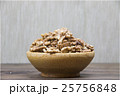Walnuts in wooden bowl 25756848