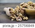 Walnuts in wooden bowl 25756849