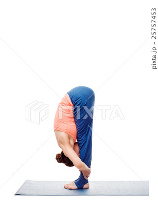 Woman doing Ashtanga Vinyasa Yoga Surya Namaskar 25757453