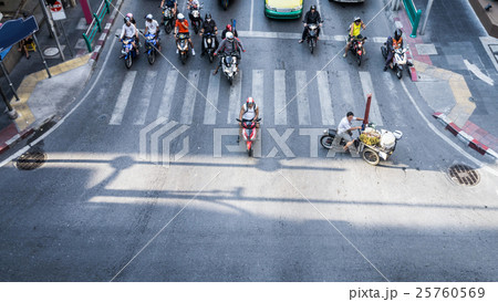 A aerial view of traffic on a street intersection 25760569