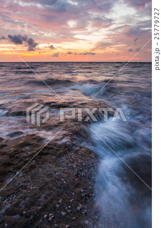 Long exposure sea and rocks at twilight Long exposure sea and rocks at twilight 25779727