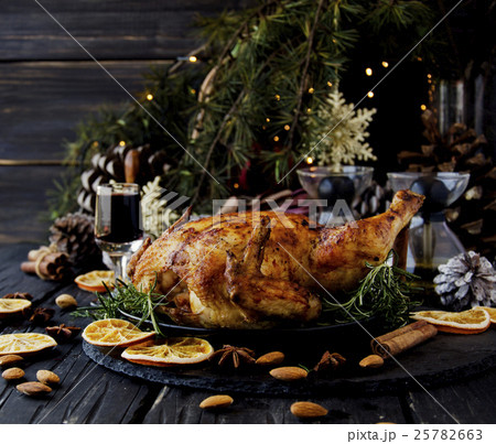 Baked chicken for Christmas or New Year Baked chicken for Christmas or New Year 25782663