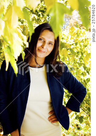 beauty mature brunette woman in park beauty mature brunette woman in park 25784620
