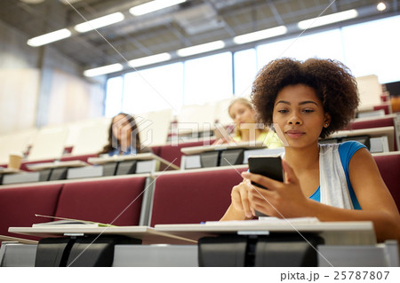 african student girl with smartphone at lecture african student girl with smartphone at lecture 25787807