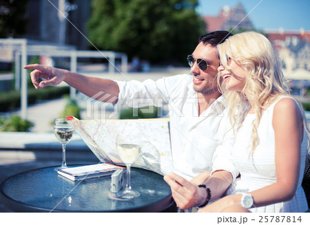 couple with map in cafe couple with map in cafe 25787814