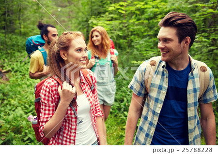 group of smiling friends with backpacks hiking group of smiling friends with backpacks hiking 25788228