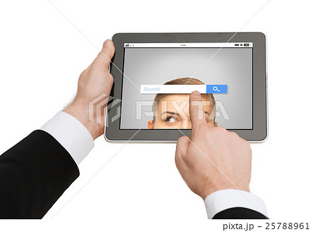 close up of hands holding tablet pc with 25788961