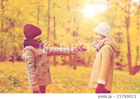 smiling children in autumn park 25789021