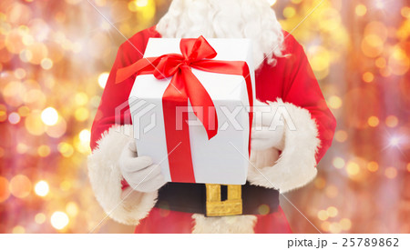 man in costume of santa claus with gift box 25789862