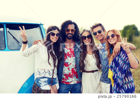 smiling young hippie friends over minivan car 25790166