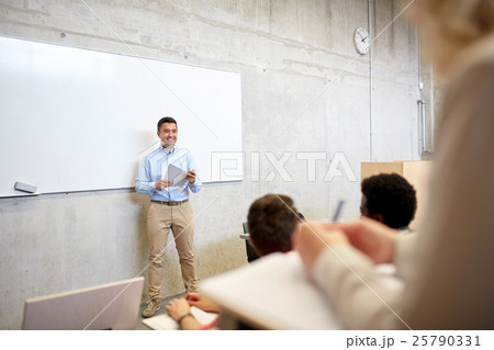 group of students and teacher at lecture group of students and teacher at lecture 25790331
