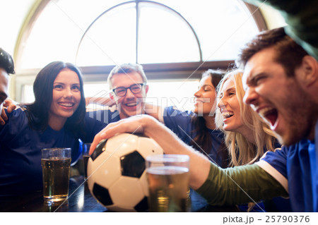 football fans or friends with beer at sport bar football fans or friends with beer at sport bar 25790376