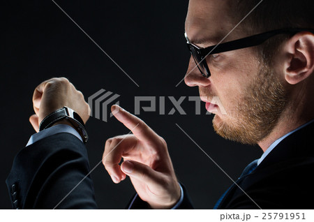 close up of businessman with smart watch close up of businessman with smart watch 25791951