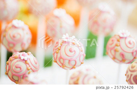 close up of cake pops or lollipops 25792426