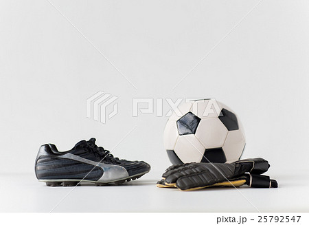 close up of goalkeeper gloves, ball, soccer boots 25792547