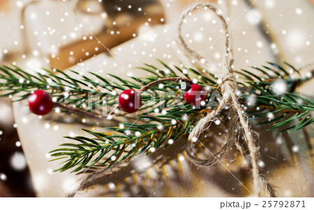 close up of christmas gift with fir brunch 25792871