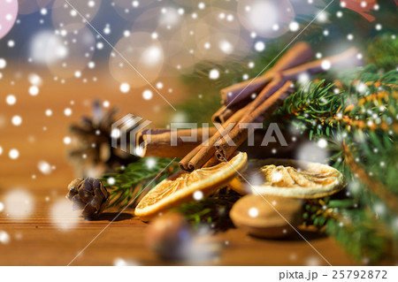 christmas fir branch, cinnamon and dried orange christmas fir branch, cinnamon and dried orange 25792872