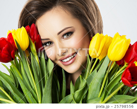 face of beautiful happy woman with flowers face of beautiful happy woman with flowers 25798556