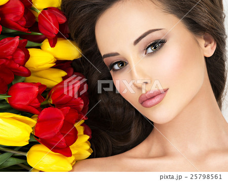 Closeup beauty face of the woman with flowers. Closeup beauty face of the woman with flowers. 25798561
