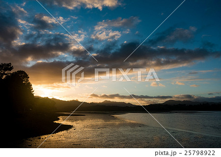 sunrise in sea bay New Zealand sunrise in sea bay New Zealand 25798922