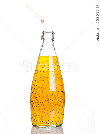 Bottle of exotic healthy juice with fruit seeds Bottle of exotic healthy juice with fruit seeds 25801547