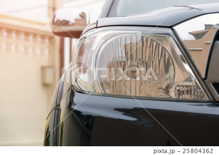 Closeup of car headlight lamp 25804362