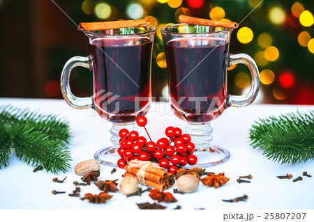Beautiful two glasses of mulled wine standing Beautiful two glasses of mulled wine standing 25807207
