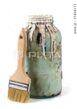 old container of paint on a white background 25808173