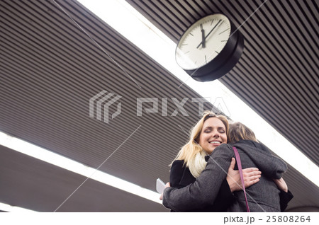 Senior couple standing at the underground platform Senior couple standing at the underground platform 25808264