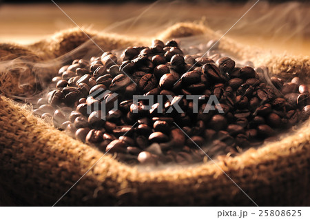 Coffee beans with smoke in burlap sack Coffee beans with smoke in burlap sack 25808625