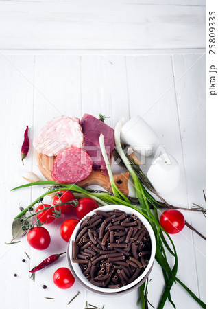 Dry Italian pasta spiraline, red cherry tomatoes,  25809335