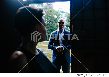 Man in the doorway, silhouette of a woman Man in the doorway, silhouette of a woman 25824943