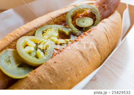 Hotdog with chili in white container Hotdog with chili in white container 25829532