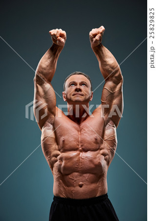 torso of attractive male body builder  25829825
