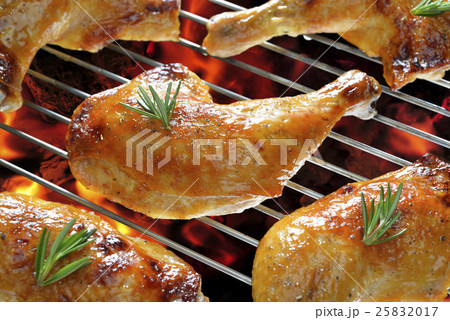 Grilled chicken thigh on the flaming grill 25832017