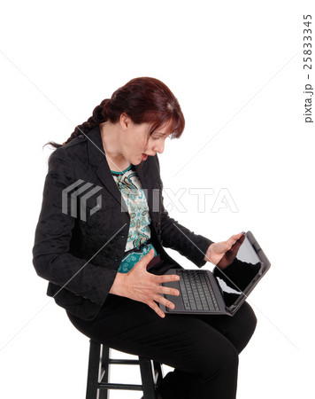 Woman wondering what is on laptop. Woman wondering what is on laptop. 25833345