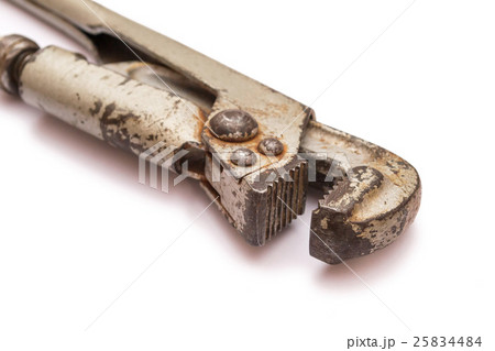 Old pipe wrench some rust isolated on a white background 25834484