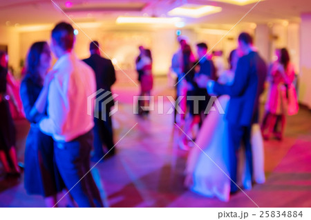 Wedding. Dancing bride and groom and guests. 25834884