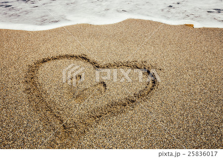 Heart painted on sand beach Heart painted on sand beach 25836017