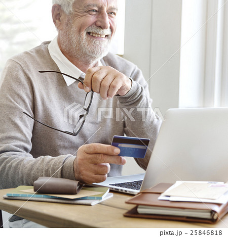 Senior Adult Holding Credit Card Concept Senior Adult Holding Credit Card Concept 25846818