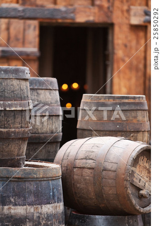 Antique oak barrels with steel hoops 25850292