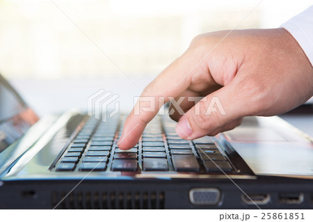finger holding to phone on keyboard finger holding to phone on keyboard 25861851