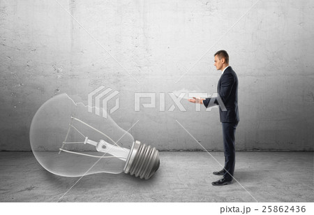 Big broken bulb fallen to the floor and Big broken bulb fallen to the floor and 25862436