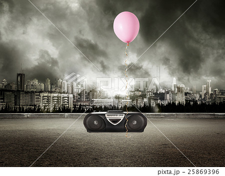 Stereo tape recorder and red balloon on storm Stereo tape recorder and red balloon on storm 25869396