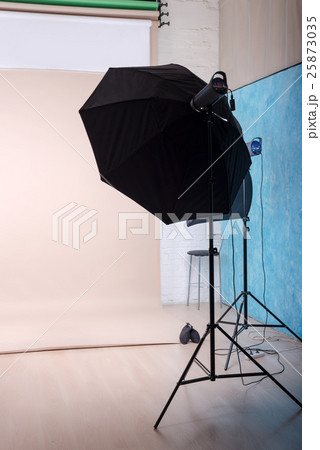Empty photo studio with lighting equipment and Empty photo studio with lighting equipment and 25873035