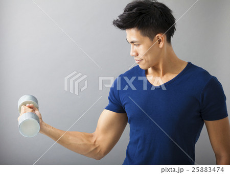 strong and young man with dumbbell strong and young man with dumbbell 25883474