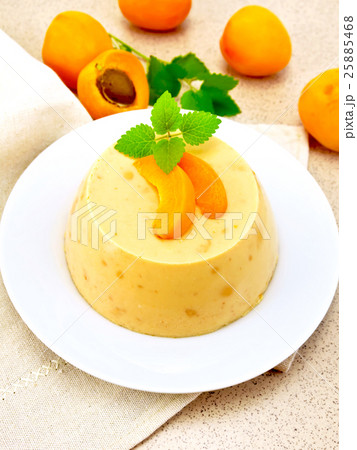 Panna cotta apricot with fruit on table Panna cotta apricot with fruit on table 25885468